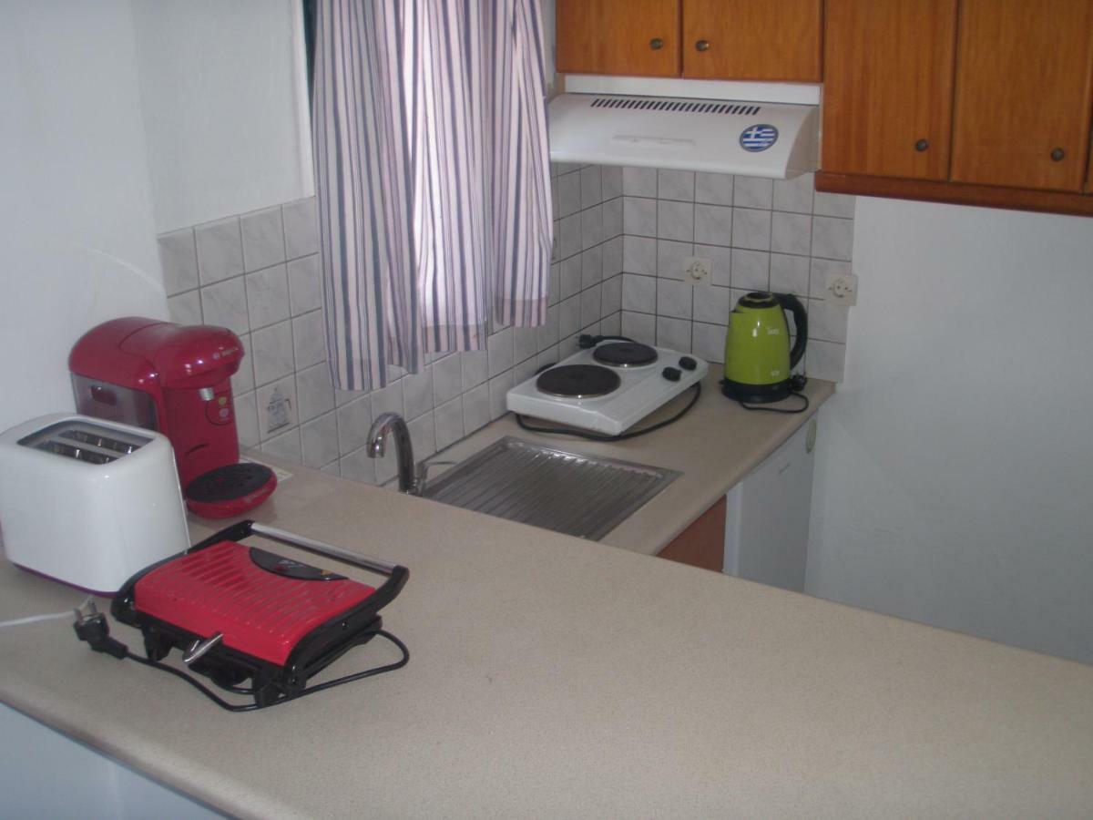 Umbrella Beach Apartments Kávos Dış mekan fotoğraf