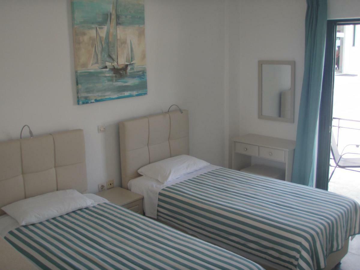 Umbrella Beach Apartments Kávos Dış mekan fotoğraf