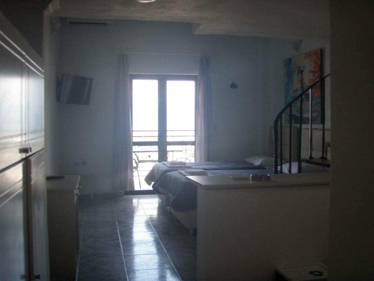 Umbrella Beach Apartments Kávos Dış mekan fotoğraf