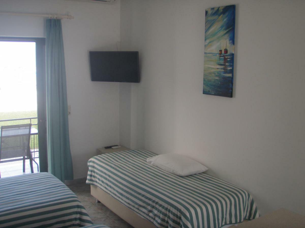 Umbrella Beach Apartments Kávos Dış mekan fotoğraf