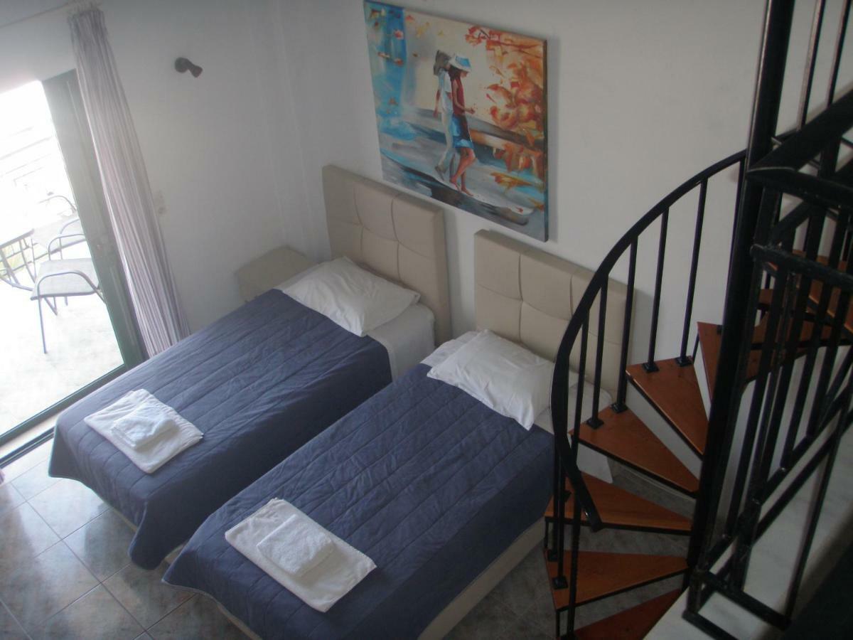 Umbrella Beach Apartments Kávos Dış mekan fotoğraf