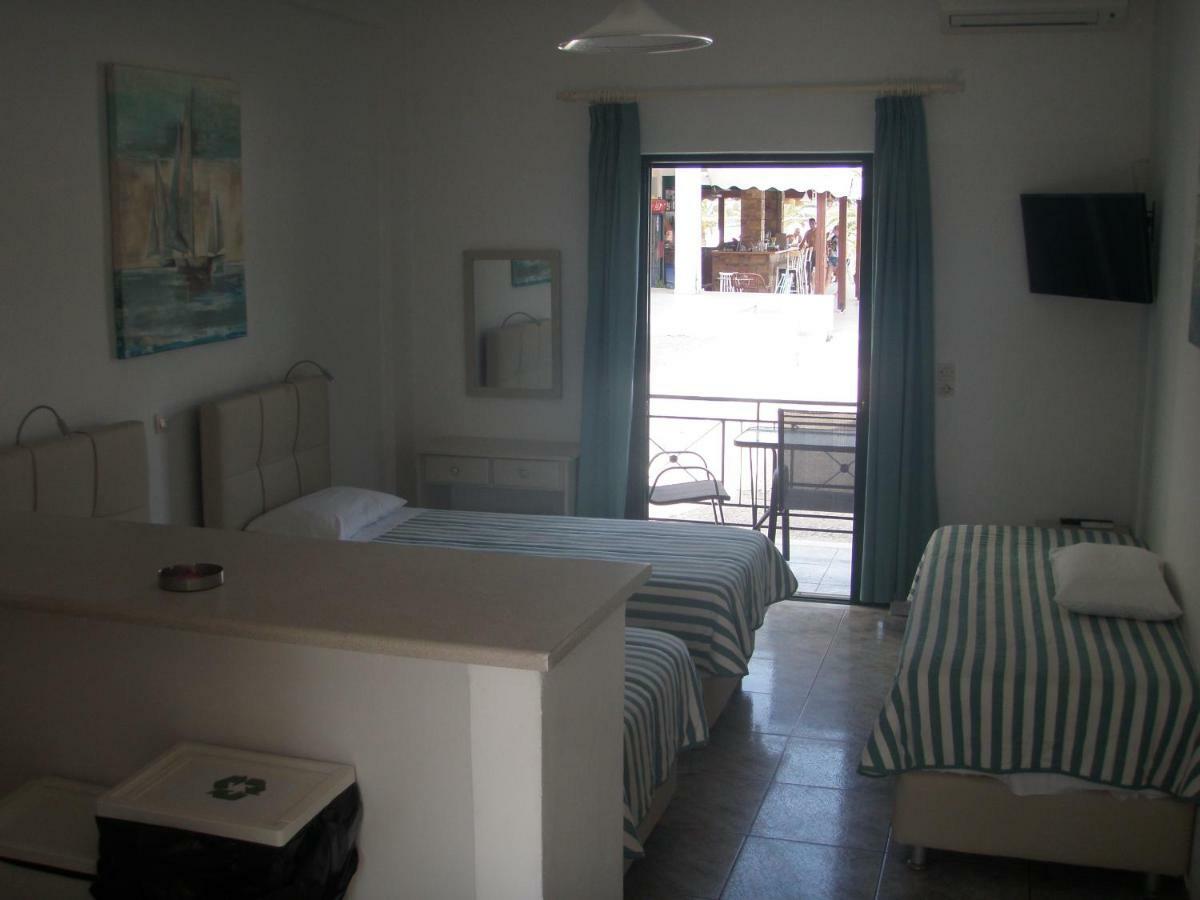 Umbrella Beach Apartments Kávos Dış mekan fotoğraf